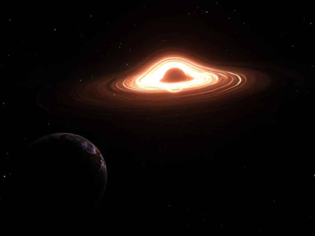 Um gigante cósmico em ação: buraco negro destrói estrela e provoca colisões com emissão de raios-X intensos, revelam astrônomos.